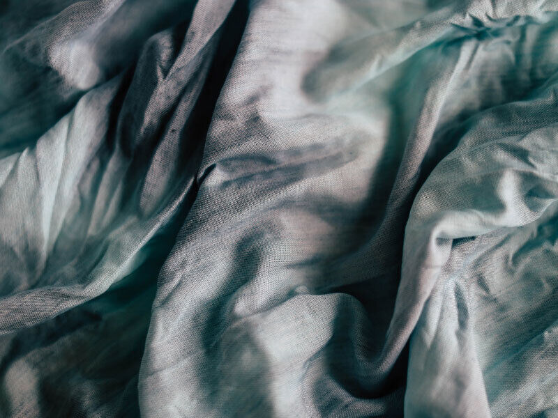 Close-up of a dark green lyocell fabric